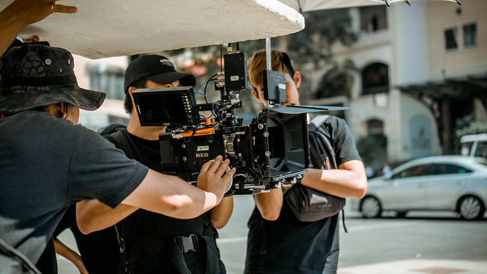 Camera crew filming with a cinema camera rig — video equipment rentals